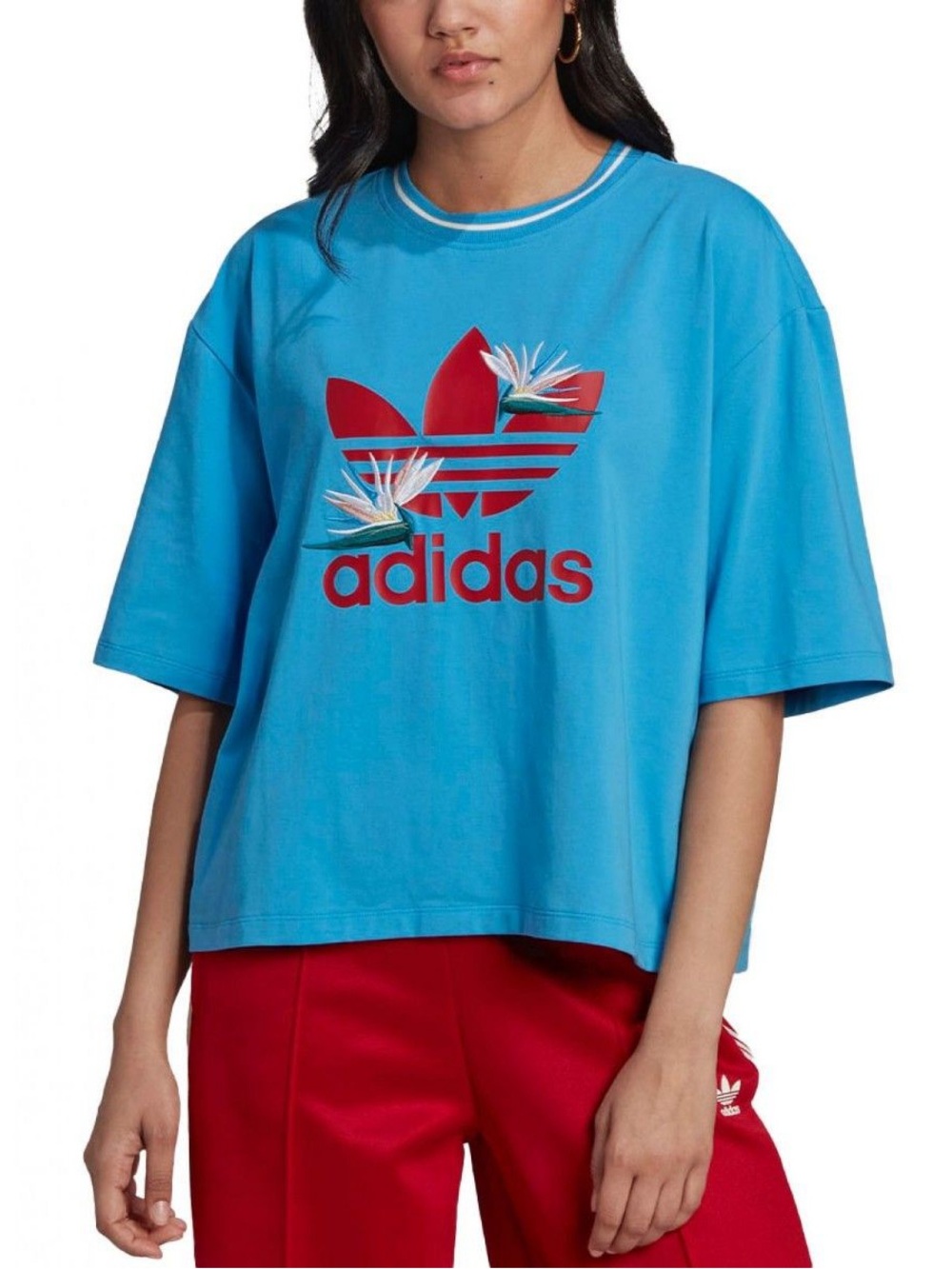 Adidas x Thebe Magugu featuring embroidered bird of paradise over a red Trefoil